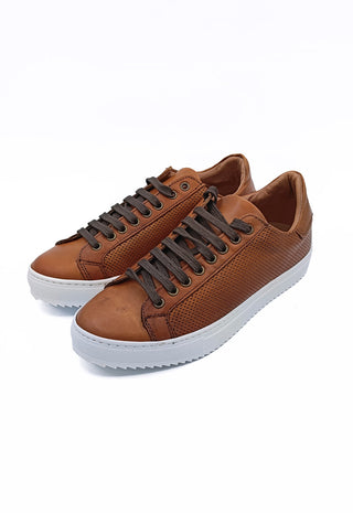Sneakers tomaia forata